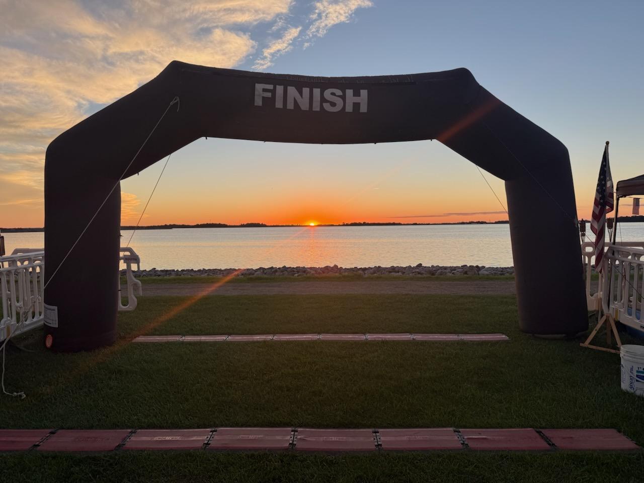 Finish arch at the reservoir at sunset during the 2026 Flag City Backyard Ultra